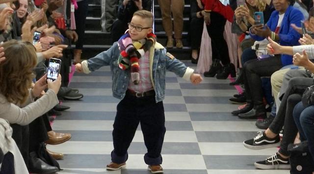 This image from video taken on Wednesday, Oct. 16, 2019 shows a boy participating in the 2nd annual “Gigi’s Playhouse Fashion Show” in New York. Gigi’s Playhouse is an education and achievement center that prepares young people with Down syndrome to engage more fully in their homes, schools and communities. (AP Photo/Gary Gerard Hamilton) (AP) This image from video taken on Wednesday, Oct. 16, 2019 shows a boy participating in the 2nd annual “Gigi’s Playhouse Fashion Show” in New York. Gigi’s Playhouse is an education and achievement center that prepares young people with Down syndrome to engage more fully in their homes, schools and communities. (AP Photo/Gary Gerard Hamilton) (AP)