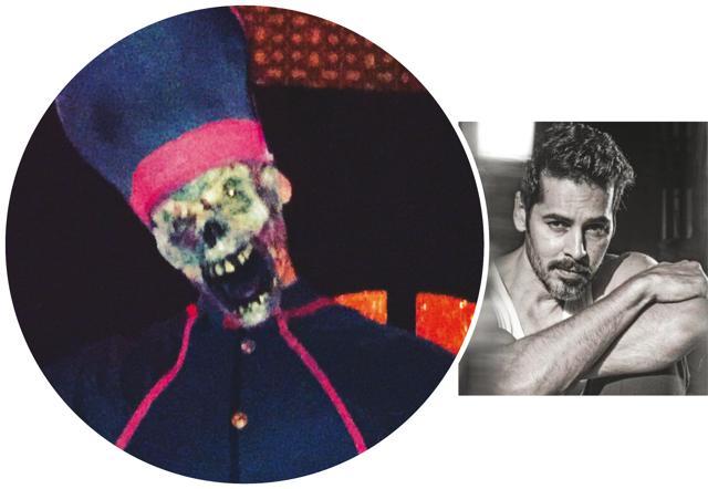 Dino wore a skeleton mask and a priest robe Dino wore a skeleton mask and a priest robe
