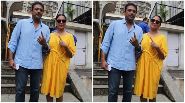 Lara Dutta with Mahesh Bhupathi at a polling station in Mumbai.