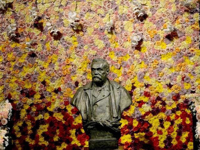 The Alfred Nobel Statue is pictured in Stockholm, Sweden, prior to the Nobel prize awarding ceremony. The winners of the Nobel Prize 2012 in the categories of medicine, physics, chemistry, literature and economics received their awards from the hands of Sweden's King Carl XVI Gustaf at a formal ceremony, followed by a gala banquet. AFP PHOTO/JONATHAN NACKSTRAND