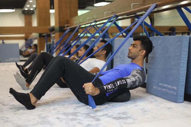 The stretch bands help strengthen core muscles and build resistance. (Physique 57 )