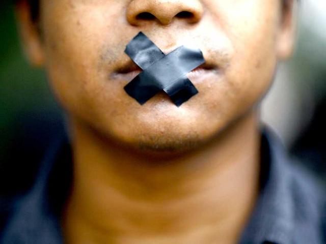 An artist, with his mouth taped, takes part in a protest demanding the safety of artist Manish Harijan and his freedom of expression, near the Kathmandu District Administration Office (DAO) in Kathmandu. According to the local media, the protest was organized by Nepalese artists because of the death threat received by Harijan for creating and exhibiting paintings depicting Hindu gods blended into images of western superheroes like Ghost Rider and Superman. The Siddhartha Art Gallery, where the paintings are currently being exhibited at, has been sealed by the DAO.(Reuters)