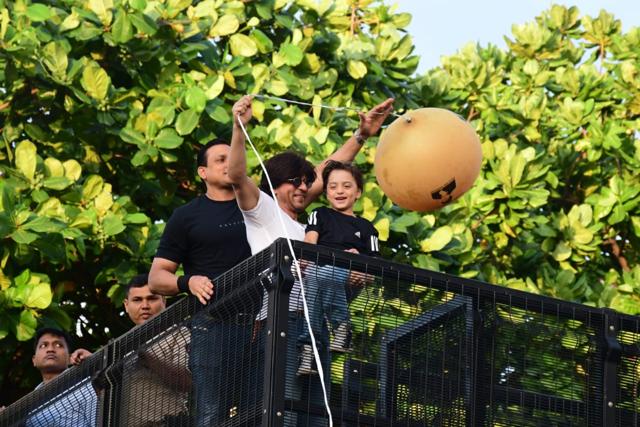 AbRam and Shah Rukh are all smiles as they greet fans. (Varinder Chawla) AbRam and Shah Rukh are all smiles as they greet fans. (Varinder Chawla)