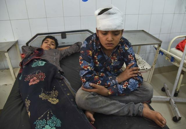 Two of the injured children under treatment at the civil hospital in Ludhiana on Sunday. (Gurpreet Singh/HT) Two of the injured children under treatment at the civil hospital in Ludhiana on Sunday. (Gurpreet Singh/HT)