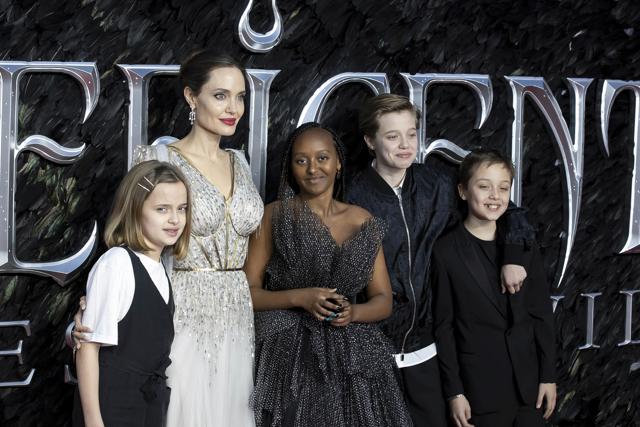 Angelina Jolie, second Left, and her children Vivienne Jolie-Pitt, from left, Zahara Jolie-Pitt, Shiloh Jolie-Pitt and Knox Leon Jolie-Pitt pose for photographers on arrival at the Premiere of the film 'Maleficent Mistress of Evil' in central London. (Grant Pollard/Invision/AP) Angelina Jolie, second Left, and her children Vivienne Jolie-Pitt, from left, Zahara Jolie-Pitt, Shiloh Jolie-Pitt and Knox Leon Jolie-Pitt pose for photographers on arrival at the Premiere of the film 'Maleficent Mistress of Evil' in central London. (Grant Pollard/Invision/AP)