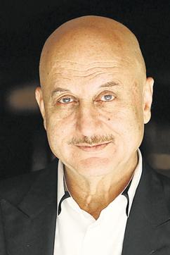 In the very beginning of his career, Anupam Kher played an old, balding character in Saaransh. Since then he has sometimes had hair on screen, and sometimes not. In real life though, he is bald and happily flaunts his baldness. (HT Photo) In the very beginning of his career, Anupam Kher played an old, balding character in Saaransh. Since then he has sometimes had hair on screen, and sometimes not. In real life though, he is bald and happily flaunts his baldness. (HT Photo)