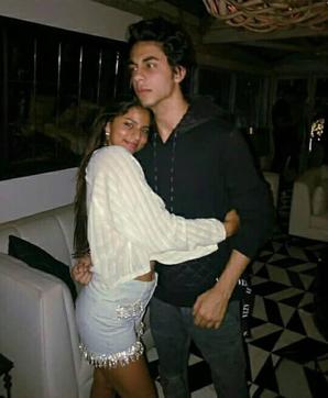 Suhana’s bejewelled hot shorts and loose white shirt combo as she hugs brother Aryan is love! (Instagram) Suhana’s bejewelled hot shorts and loose white shirt combo as she hugs brother Aryan is love! (Instagram)