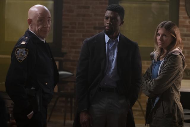 This image released by STXfilms shows, from left, JK Simmons, Chadwick Boseman and Sienna Miller in a scene from 21 Bridges. (AP) This image released by STXfilms shows, from left, JK Simmons, Chadwick Boseman and Sienna Miller in a scene from 21 Bridges. (AP)