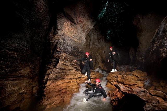 The tubing experience begins with you, clad in your wetsuit, jumping into the river. (Karishma Kirpalani)
