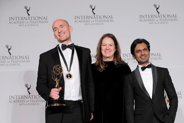 James Watkins, Dixie Linder and Nawazuddin Siddiqui pose with Drama award for McMafia at the 47th International Emmy Awards in New York City. (REUTERS) James Watkins, Dixie Linder and Nawazuddin Siddiqui pose with Drama award for McMafia at the 47th International Emmy Awards in New York City. (REUTERS)