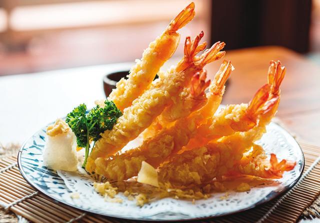 The Japanese tempura is crisper than pakoras as it uses wheat, which has gluten (Shutterstock)