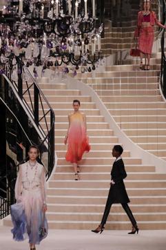 ModelS wear creationS for Chanel's Metiers d'Art collection presented at the Grand Palais in Paris, Wednesday, Dec.4, 2019. (AP Photo/Francois Mori) (AP) ModelS wear creationS for Chanel's Metiers d'Art collection presented at the Grand Palais in Paris, Wednesday, Dec.4, 2019. (AP Photo/Francois Mori) (AP)