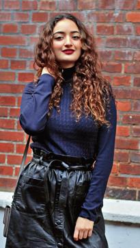 Pairing a navy blue blouse with a black skirt is simple, suave, and makes for an excellent am/pm wear (Ranim Helwani)