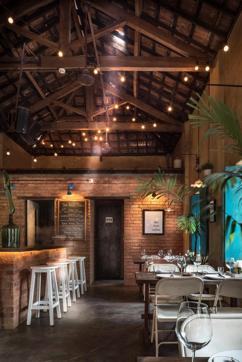 The Rice Mill Cafe, in an adapted rice mill in Morjim, Goa, wears a distressed look to retain a sense of what it was — as well as keep costs down. ‘In a lot of such projects, people go overboard with the spending, and then it becomes very difficult to make the venture profitable,’ says owner, architect and heritage conservationist Raya Shankwalker. (Harshan Thomson) The Rice Mill Cafe, in an adapted rice mill in Morjim, Goa, wears a distressed look to retain a sense of what it was — as well as keep costs down. ‘In a lot of such projects, people go overboard with the spending, and then it becomes very difficult to make the venture profitable,’ says owner, architect and heritage conservationist Raya Shankwalker. (Harshan Thomson)