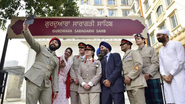 Members of the British army delegation taking a selfie at the Saragarhi Gurdwara in Amritsar on Wednesday. (Sameer Sehgal/HT) Members of the British army delegation taking a selfie at the Saragarhi Gurdwara in Amritsar on Wednesday. (Sameer Sehgal/HT)