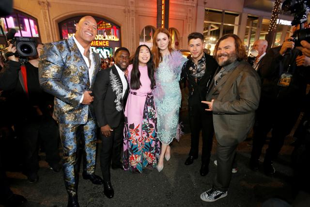 Cast members (L-R) Dwayne Johnson, Kevin Hart, Awkwafina, Karen Gillan, Nick Jonas, and Jack Black pose at the premiere for the film Jumanji: The Next Level. (REUTERS) Cast members (L-R) Dwayne Johnson, Kevin Hart, Awkwafina, Karen Gillan, Nick Jonas, and Jack Black pose at the premiere for the film Jumanji: The Next Level. (REUTERS)
