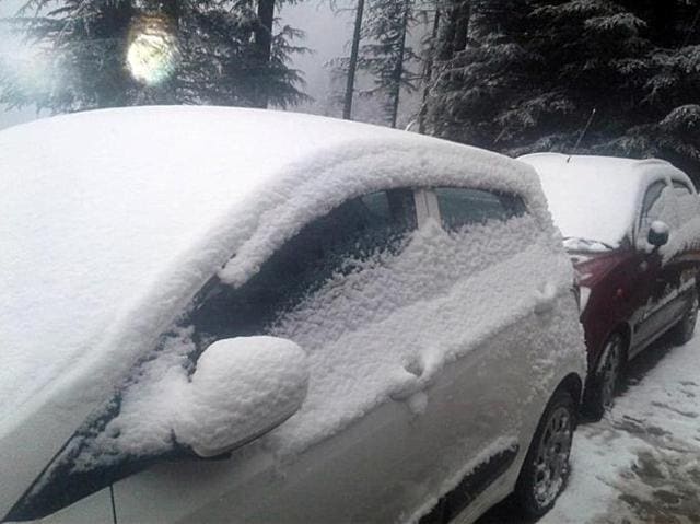 Cars covered with snow in Kufri, 14 km from Shimla, on Thursday. (ANI PHOTO) Cars covered with snow in Kufri, 14 km from Shimla, on Thursday. (ANI PHOTO)