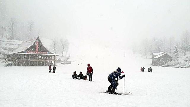 Tourists enjoying the snowfall at Solang Valley near Manali on Thursday. (ANI Photo) Tourists enjoying the snowfall at Solang Valley near Manali on Thursday. (ANI Photo)