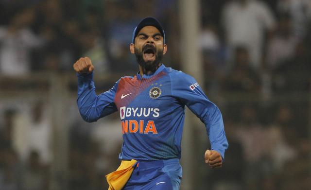 Virat Kohli celebrates the dismissal of Shimron Hetmyer during the third and final T20 match between India and West Indies at Wankhede Stadium in Mumbai on Wednesday. Virat Kohli celebrates the dismissal of Shimron Hetmyer during the third and final T20 match between India and West Indies at Wankhede Stadium in Mumbai on Wednesday.