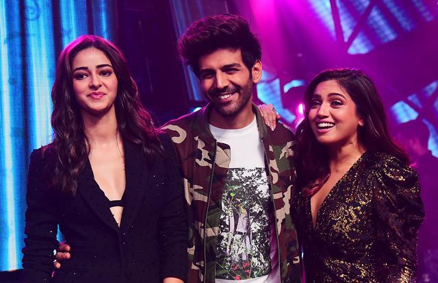 Ananya Panday (L), Kartik Aryan (C) and Bhumi Pednekar pose on the set of music reality show Indian Idol 11 to promote Pati Patni Aur Woh in Mumbai. (AFP) Ananya Panday (L), Kartik Aryan (C) and Bhumi Pednekar pose on the set of music reality show Indian Idol 11 to promote Pati Patni Aur Woh in Mumbai. (AFP)