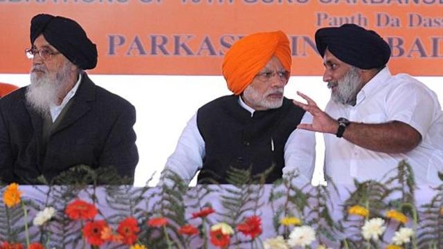 Prime Minister Narendra Modi and SAD president Sukhbir Singh Badal during a function to mark the 350th birth anniversary celebrations of Guru Gobind Singh at Anandpur Sahib Gurudwara in 2016. (Hindustan Times via Getty Images) Prime Minister Narendra Modi and SAD president Sukhbir Singh Badal during a function to mark the 350th birth anniversary celebrations of Guru Gobind Singh at Anandpur Sahib Gurudwara in 2016. (Hindustan Times via Getty Images)