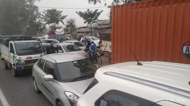 The traffic jam on National Highway-1 due to the protest outside the school, which is located along the road. Traffic has been diverted through link roads in the area. (HT Photo) The traffic jam on National Highway-1 due to the protest outside the school, which is located along the road. Traffic has been diverted through link roads in the area. (HT Photo)