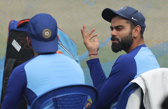 India's captain Virat Kohli, right, speaks with a teammate during a training session (AP) India's captain Virat Kohli, right, speaks with a teammate during a training session (AP)