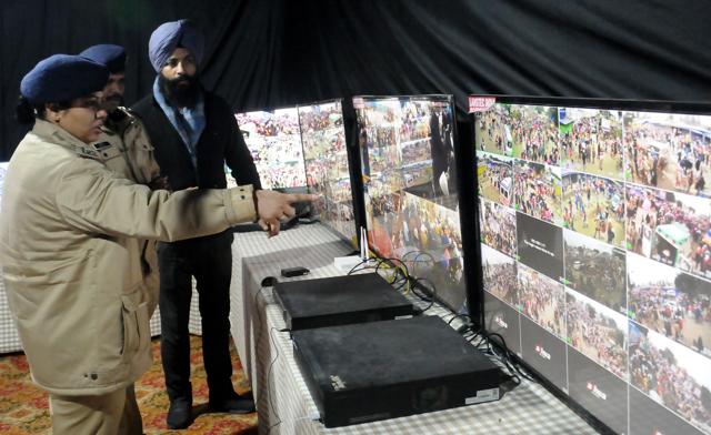 Fatehgarh Sahib senior superintendent of police Amneet Kondal monitoring the security arrangements at the venue from the main control room on the occasion of Shaheedi Jor Mela on Friday. (HT PHOTO) Fatehgarh Sahib senior superintendent of police Amneet Kondal monitoring the security arrangements at the venue from the main control room on the occasion of Shaheedi Jor Mela on Friday. (HT PHOTO)
