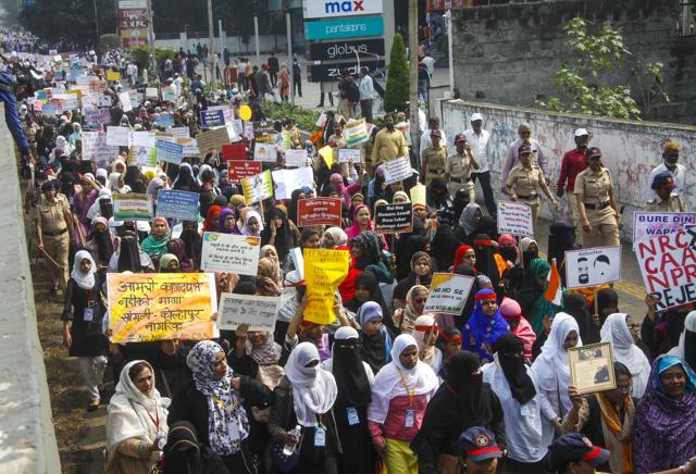 The march saw protesters shouting slogans against the new citizenship law and held placards with messages like “We reject Modi Made Holocaust”, “We Reject CAA and NRC”, “Stop dividing India” and “Boycott CAA and NRC” (HT/PHOTO) The march saw protesters shouting slogans against the new citizenship law and held placards with messages like “We reject Modi Made Holocaust”, “We Reject CAA and NRC”, “Stop dividing India” and “Boycott CAA and NRC” (HT/PHOTO)