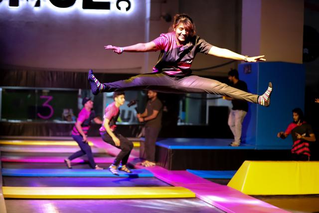 A girl jumps on a trampoline at Bounce Inc A girl jumps on a trampoline at Bounce Inc