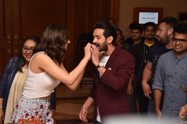 Deepika Padukone gives a slice of her birthday cake to Vikrant Massey. (Varinder Chawla) Deepika Padukone gives a slice of her birthday cake to Vikrant Massey. (Varinder Chawla)