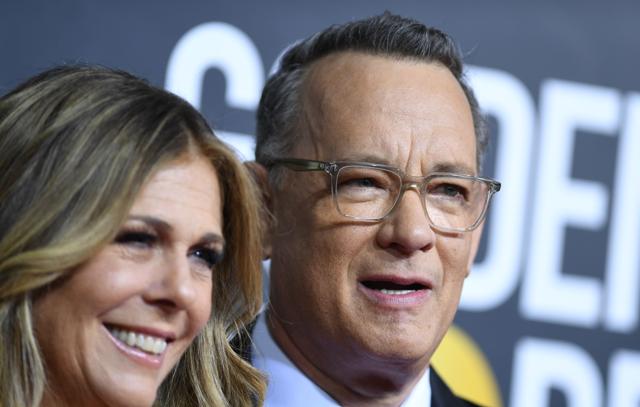 US actor Tom Hanks and wife Rita Wilson arrive for the 77th annual Golden Globe Awards. (AFP) US actor Tom Hanks and wife Rita Wilson arrive for the 77th annual Golden Globe Awards. (AFP)