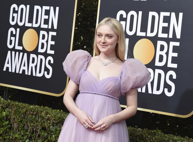Dakota Fanning arrives at the 77th annual Golden Globe Awards at the Beverly Hilton Hotel. (Jordan Strauss/Invision/AP)
