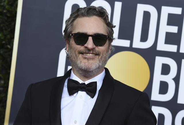 Joaquin Phoenix arrives at the 77th annual Golden Globe Awards at the Beverly Hilton Hotel. (Jordan Strauss/Invision/AP)