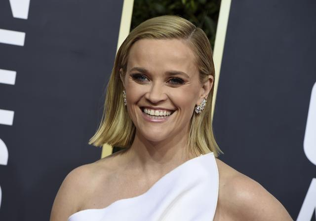 Reese Witherspoon arrives at the 77th annual Golden Globe Awards at the Beverly Hilton Hotel. (Jordan Strauss/Invision/AP)