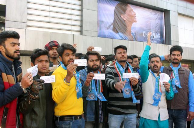 NSUI activists show movie tickets outside a cineplex in solidarity with Bollywood actor Deepika Padukone for her film Chhapaak. NSUI activists show movie tickets outside a cineplex in solidarity with Bollywood actor Deepika Padukone for her film Chhapaak.