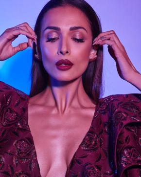 Although minimal pink and nude lip colours are always in, wine lips are a new rave. (Instagram/malaikaaroraofficial)