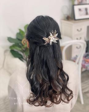 Barrettes and combs are a simple and classy replacement for the overused tiara. (Instagram/ carmen_yumis_makeup)