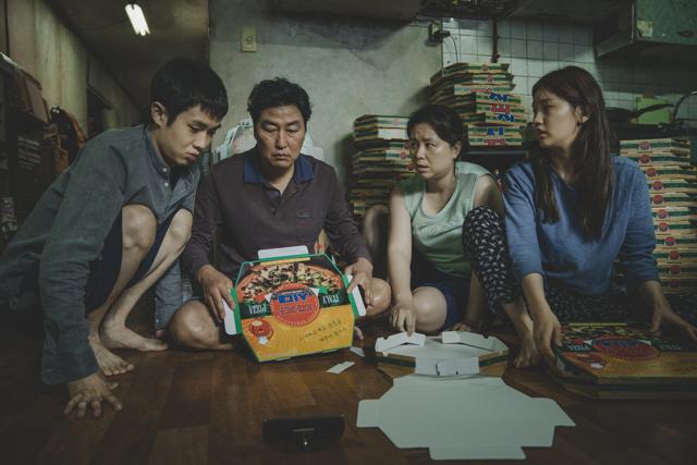 This image released by Neon shows Woo-sik Choi, from left, Kang-ho Song, Hye-jin Jang and So-dam Park in a scene from Parasite. (AP) This image released by Neon shows Woo-sik Choi, from left, Kang-ho Song, Hye-jin Jang and So-dam Park in a scene from Parasite. (AP)