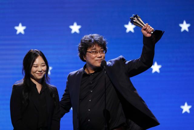 Bong Joon-ho with Interpreter Sharon Choi accept the Best Director award for Parasite during the 25th Critics Choice Awards Show at Santa Monica in California. (REUTERS) Bong Joon-ho with Interpreter Sharon Choi accept the Best Director award for Parasite during the 25th Critics Choice Awards Show at Santa Monica in California. (REUTERS)