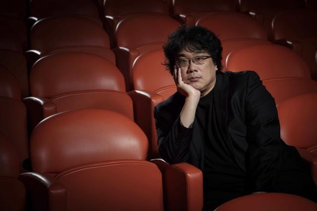 Bong Joon-Ho poses for a portrait at the Whitby Hotel screening room in New York to promote his film Parasite. (Christopher Smith/Invision/AP) Bong Joon-Ho poses for a portrait at the Whitby Hotel screening room in New York to promote his film Parasite. (Christopher Smith/Invision/AP)