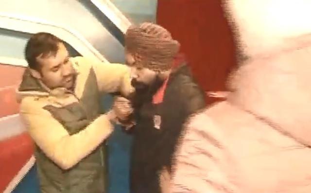 Police kept waiting outside the studio for 10 minutes, before barging in and arresting Maninder on live TV.