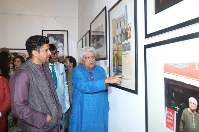 Javed explains details about a particular picture to his son, Farhan. Javed explains details about a particular picture to his son, Farhan.