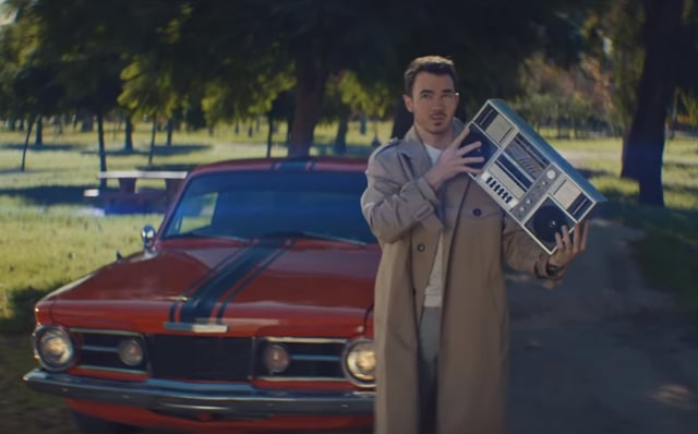 Kevin Jonas recreated John Cusack’s iconic scene from Say Anything.