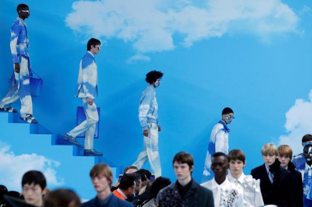Men's Fashion Week: In Vuitton's catwalk 'heaven', slick suits