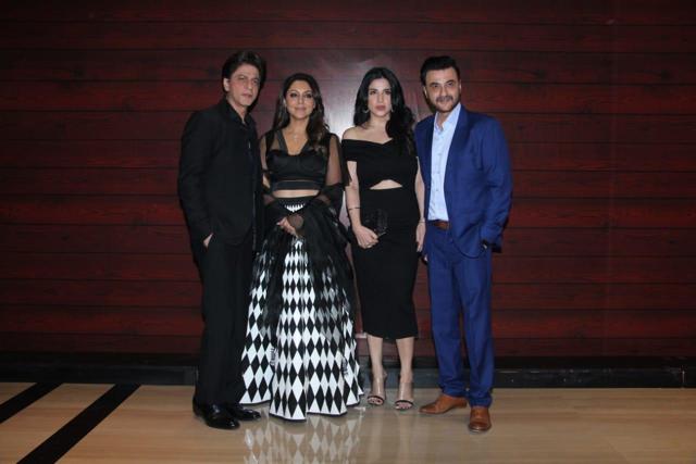 Shah Rukh Khan poses with wife Gauri and Sanjay Kapoor. (Varinder Chawla)