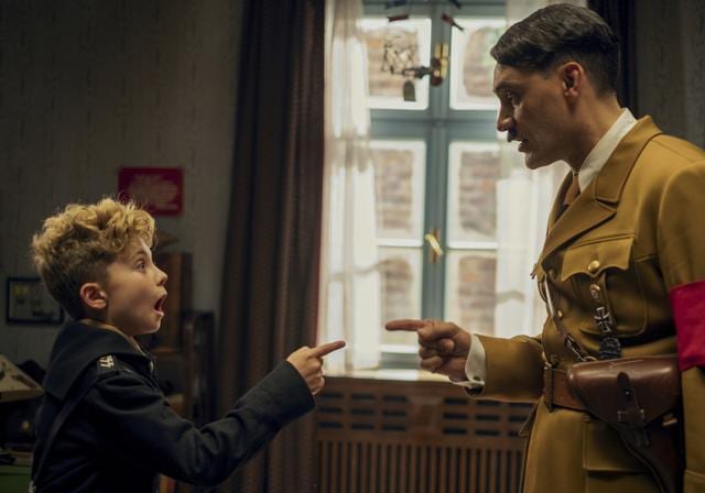 This image released by Fox Searchlight Pictures shows, from left, Roman Griffin Davis and Taika Waititi in a scene from the WWII satirical film Jojo Rabbit. (AP) This image released by Fox Searchlight Pictures shows, from left, Roman Griffin Davis and Taika Waititi in a scene from the WWII satirical film Jojo Rabbit. (AP)