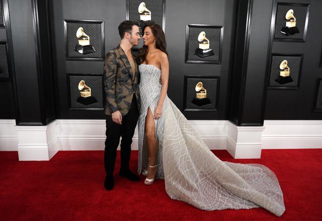 Kevin Jonas and Danielle Jonas at the Grammys. (REUTERS) Kevin Jonas and Danielle Jonas at the Grammys. (REUTERS)
