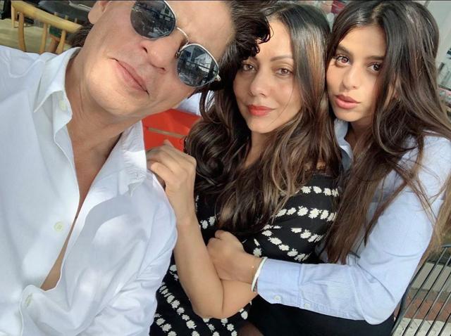 Suhana keeps it casual in a white shirt with parents Shah Rukh and Gauri Khan. (Instagram/iamsrk) Suhana keeps it casual in a white shirt with parents Shah Rukh and Gauri Khan. (Instagram/iamsrk)