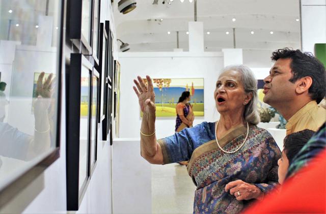 Bollywood veteran actor Waheeda Rehman at the inauguration of an Art Exhibition Chronological Clouds by well-known artist Raj Bharti, at an art gallery in Mumbai on Tuesday. Bollywood veteran actor Waheeda Rehman at the inauguration of an Art Exhibition Chronological Clouds by well-known artist Raj Bharti, at an art gallery in Mumbai on Tuesday.